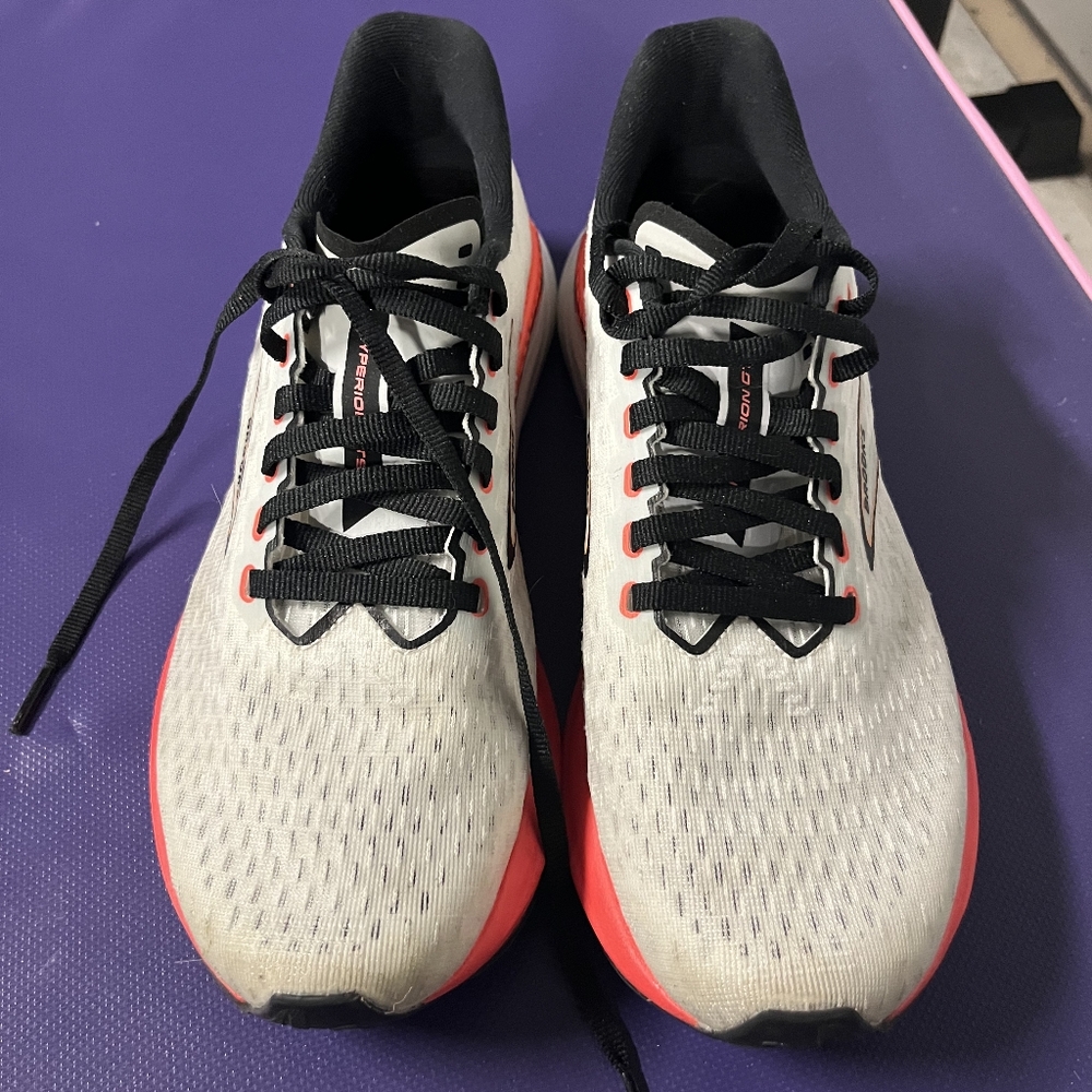 White and Red Athletic Shoes